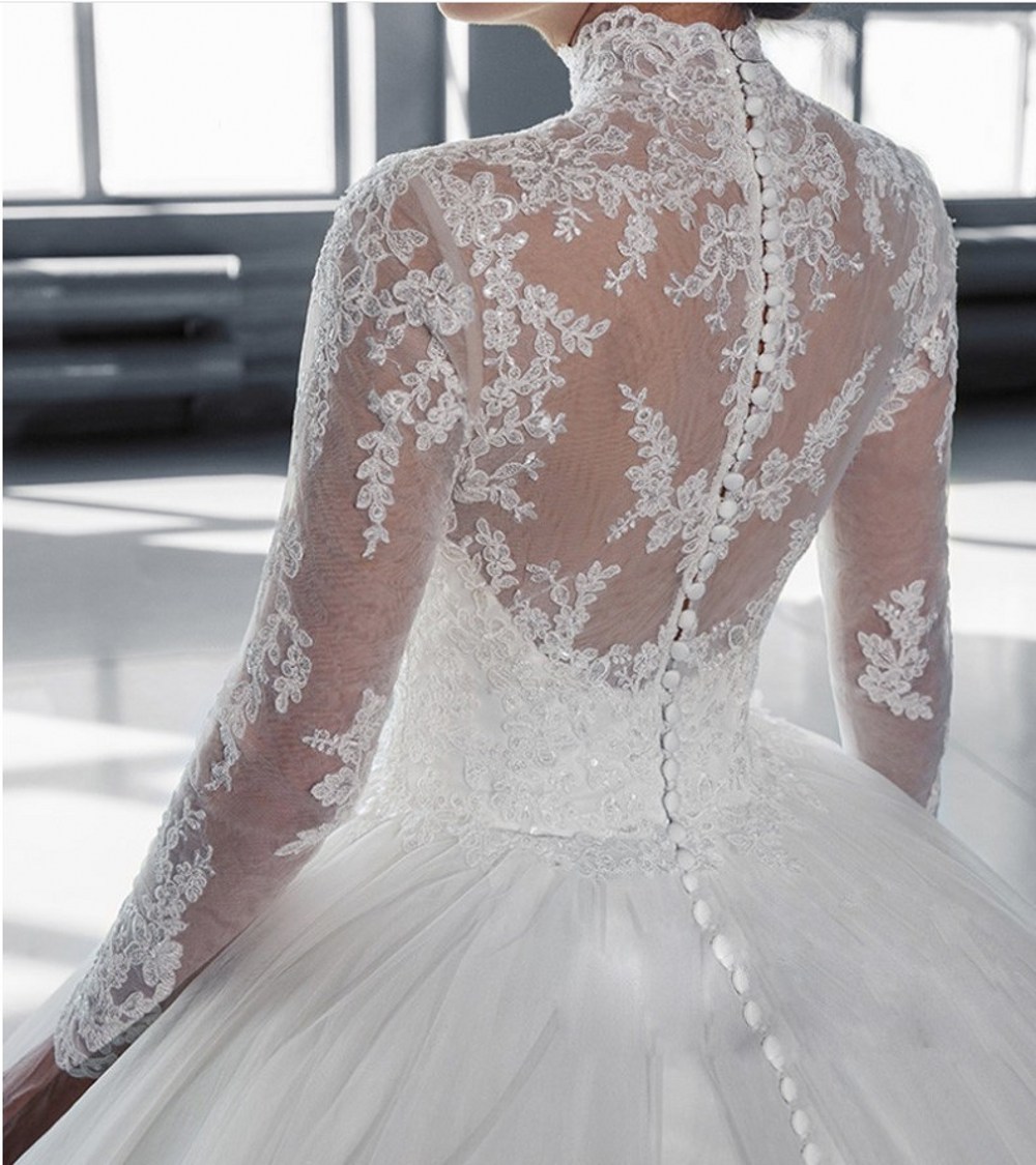 New wedding lace row flower long sleeve large tail tutu skirt Bride wedding dress factory wholesale