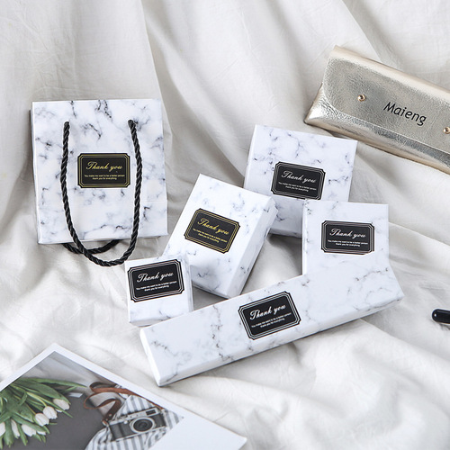 Batch wholesale marble jewelry box with top and bottom covers, rings, earrings, ear studs, bracelets, pearl necklaces, and accessories.