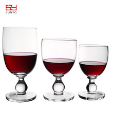 厂家供应人工吹制无铅透明玻璃杯 创意杯腿搓珠工艺玻璃杯红酒杯