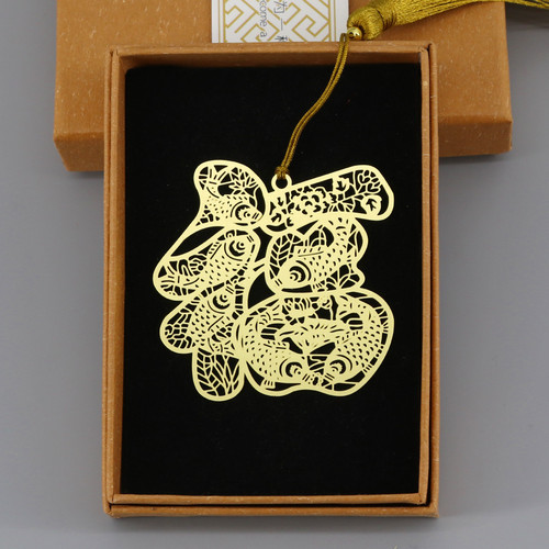 Chinese-style, intricate hollow metal tassel bookmark with a Buddha-like design, exquisitely crafted gift