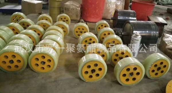 供应湖北随州工业设备用橡胶滚轮加工包胶挂胶