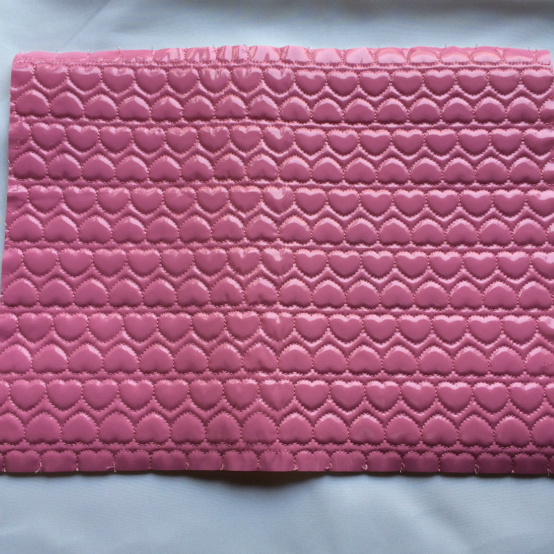 厂家供应特价桃心美甲手枕化妆包鞋帽皮带PU皮革绗缝可加工来样定