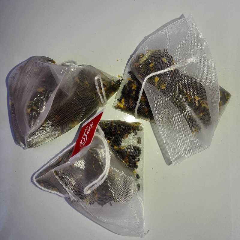 厂家直供奶茶原料3克带线带标三角袋原味桂花乌龙茶和玫瑰乌龙茶