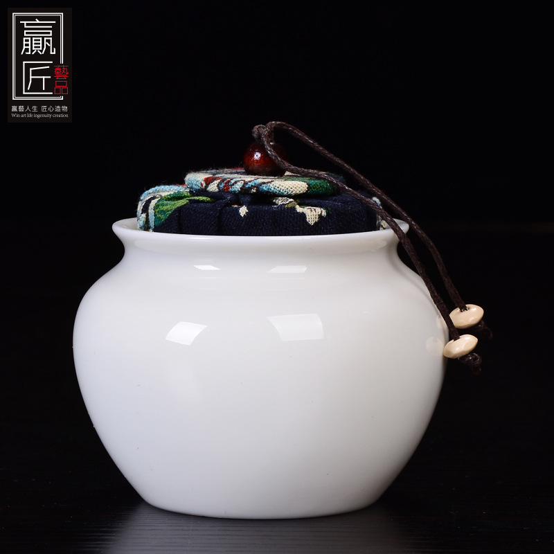 Winjiang blanco porcelana sellada tarro de té Corcho de cerámica sellado tarro pequeño tamaño Pu'er almacén de té ovejas grasa Jade porcelana tarro de té