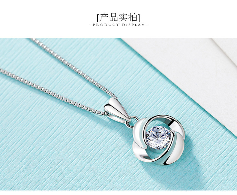 Four-leaf Clover Rotating Pendant Rose Flower Zircon Necklace Simple Fashion Jewelry display picture 1