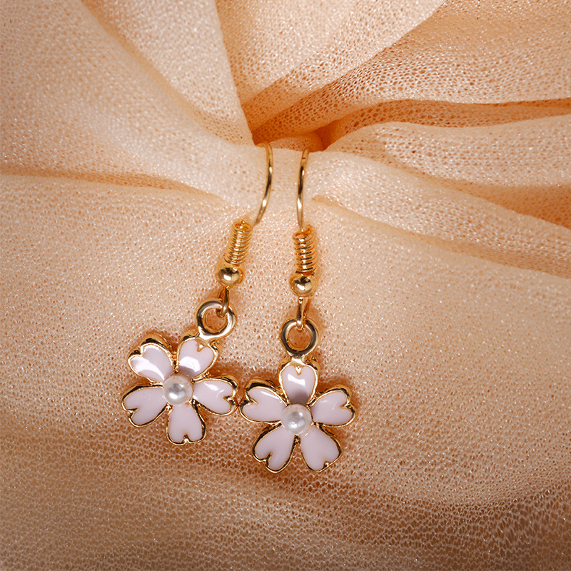 Korean Oil Pink Cherry Blossom Pearl Earrings Korean Shamrock Earring Wholesale Nihaojewelry display picture 6