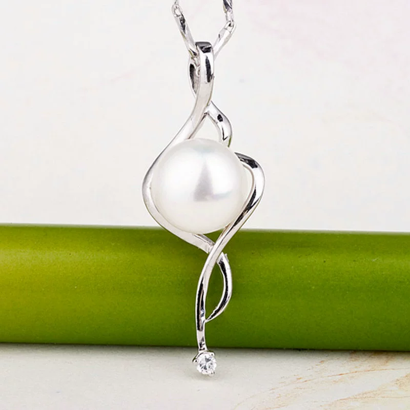 Organic pendant from pearl, simple and elegant design, silver 925 sample