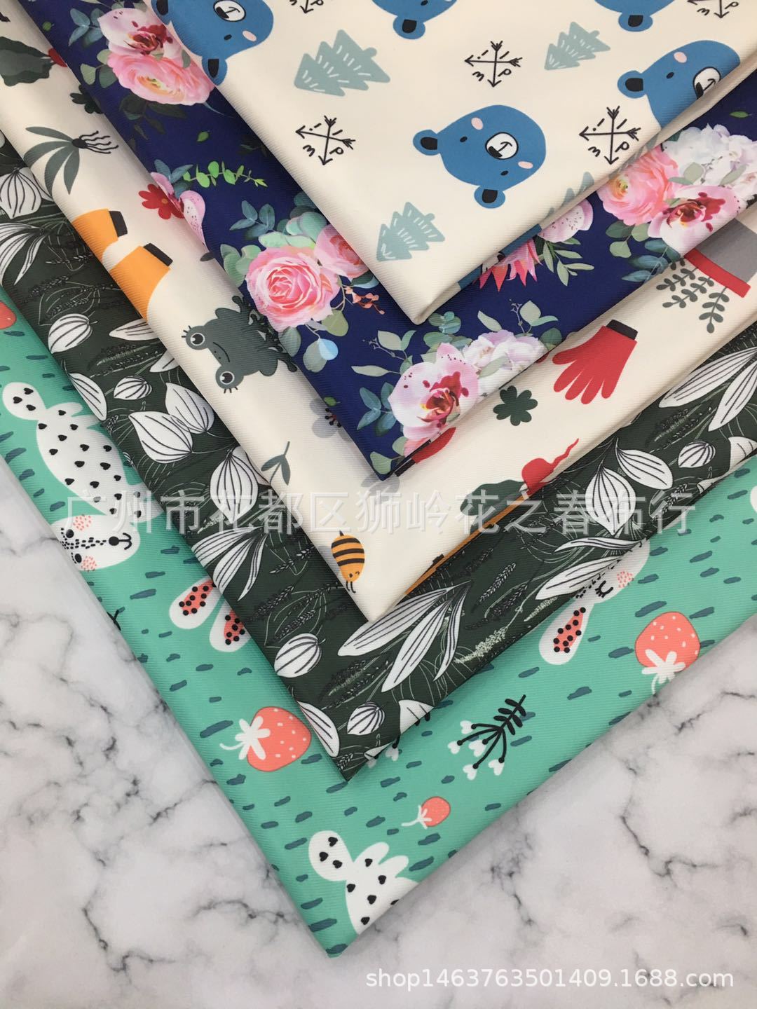 花之春涤纶牛津印花布大斜纹复合布妈咪包箱包购物袋布料厂家直销