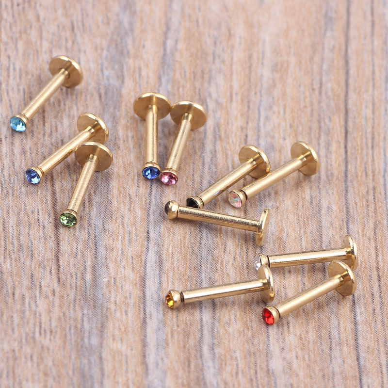 Silver pointed spike labret stud material detail
