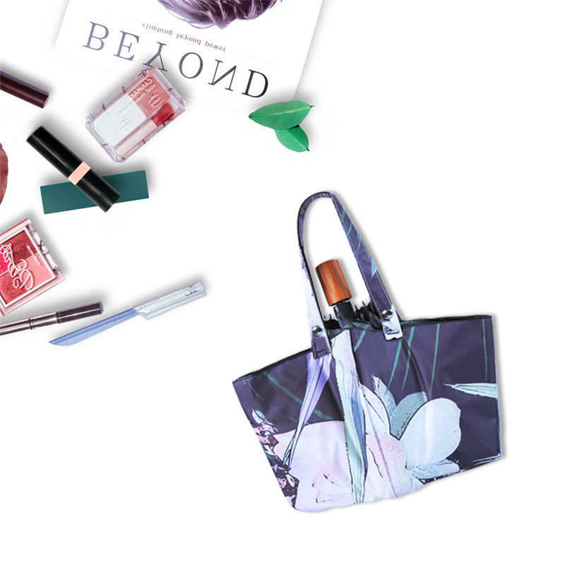 Creative three-fold folding black rubber umbrella seconds change handbag umbrella printing high-end gift umbrella bag umbrella a generation of hair