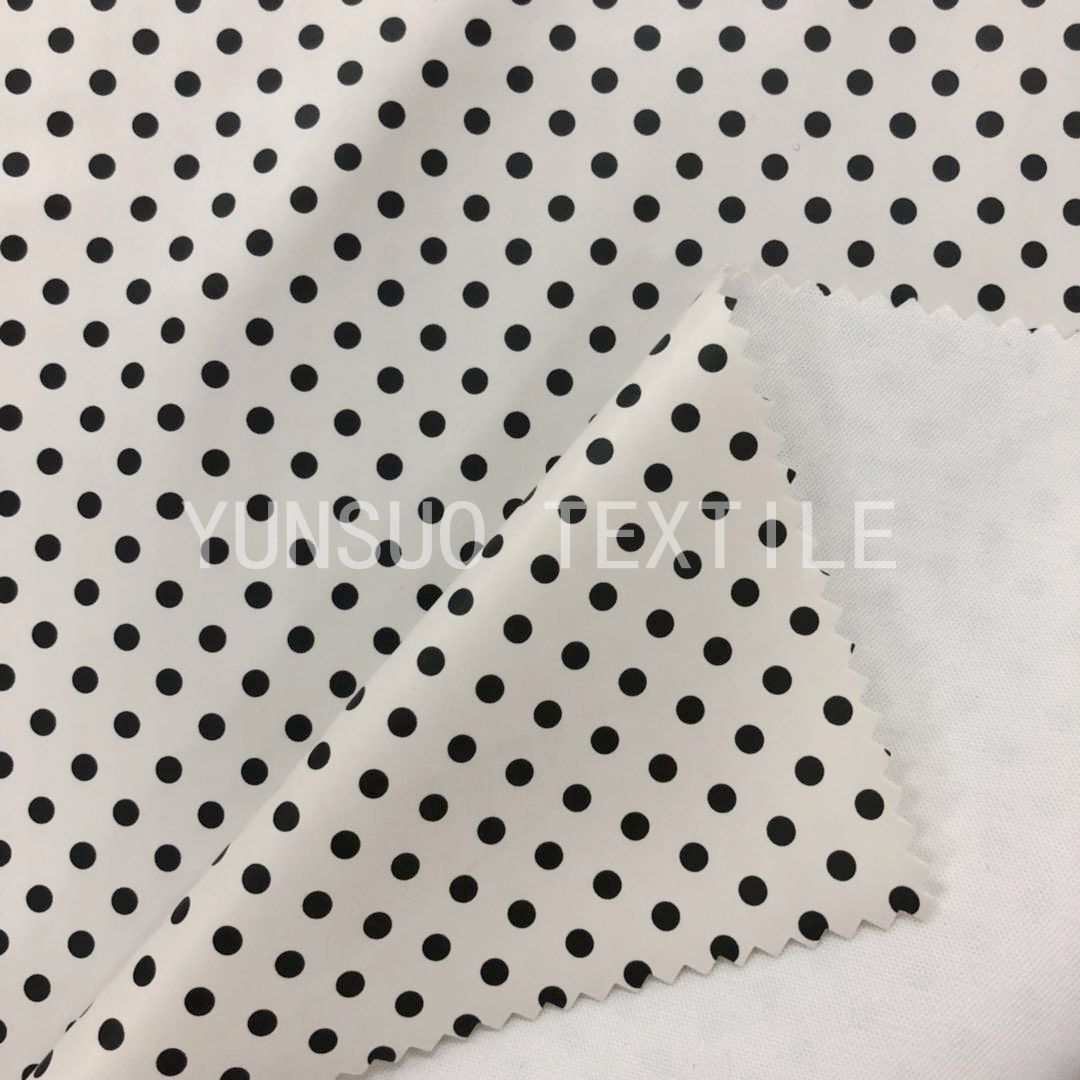 白底黑点 印花人造革 PU童装