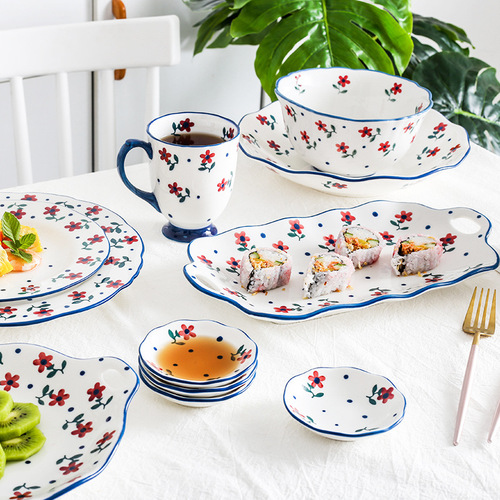 Japanese-style hand-painted small flower ceramic tableware set, including rice bowl, soup bowl, plate, western-style plate, mug, saucer, and soup spoon for home use.