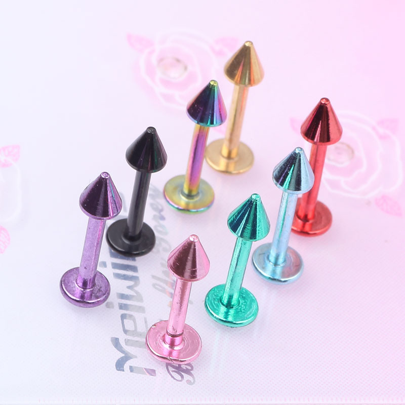 Silver pointed spike labret stud material detail