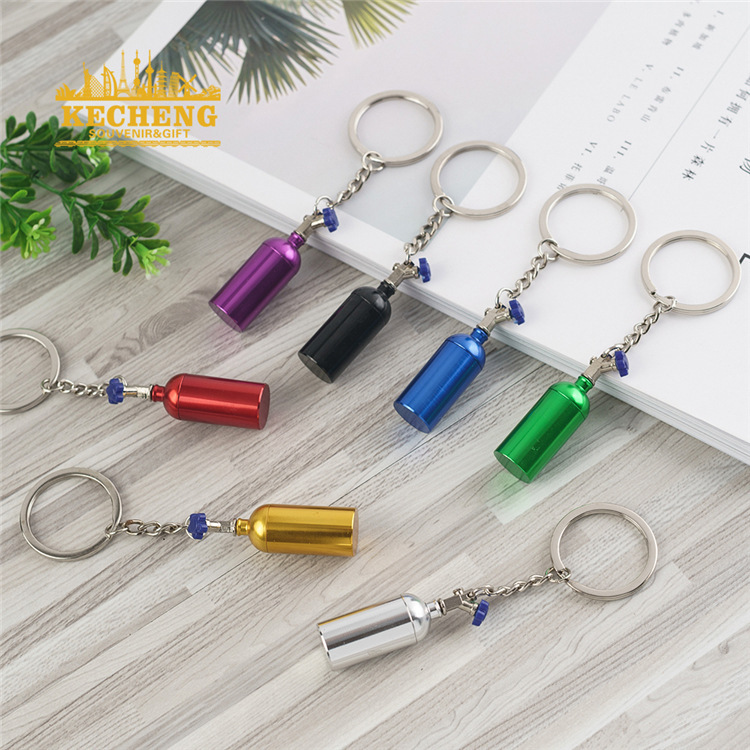 Creative turbine bottle keychain cartoon metal mobile phone pendant accessories NOS nitrogen cylinder car keychain