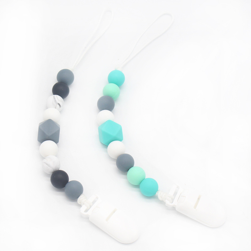 INS popular cadena de chupete suministros para bebés clip de chupete de silicona Amazon mordedor cadena anti-caída cinturón