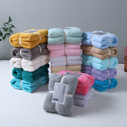Factory direct supply of warp knitted polyester and brocade 260 flat coral velvet bath towels wholesale adult absorbent and ever-changing bath towels wholesale