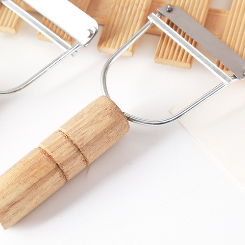 Stainless steel melon plane, wooden handle plane, paring knife, peeler, kitchen gadgets, direct supply from two yuan store