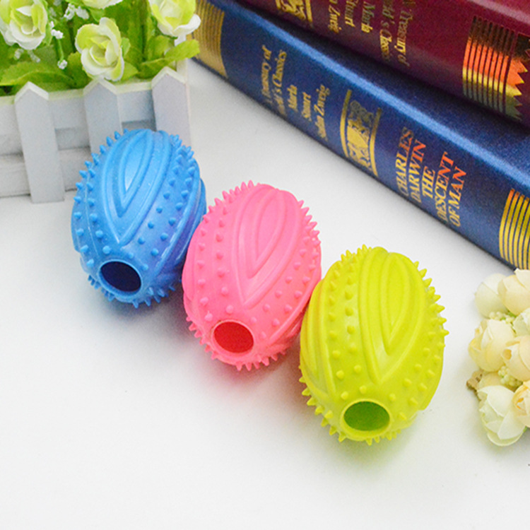 Pelota de juguete para mascotas nuevo rugby TPR perro sonido pelota de goma entrenamiento para perros juguete interactivo precio de fábrica ventas directas