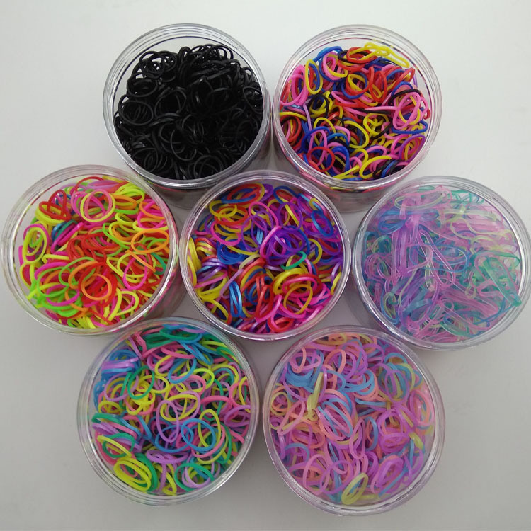 500 small rubber bands in a round box for children and girls to tie…