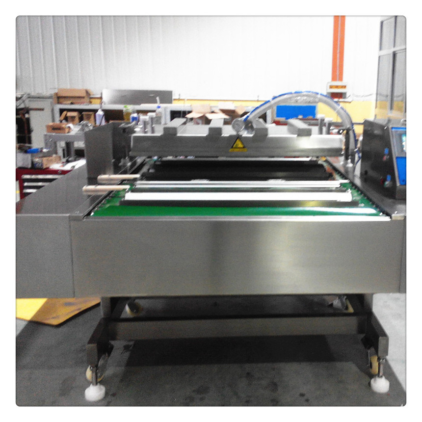 新款滚动式1000型全自动真空包装机 链条连续真空封口机|ru