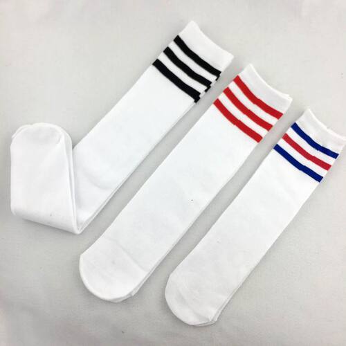 Students wear three-striped sports socks that don’t reach the knees. Children’s stockings for Children’s Day. Football socks wholesale.