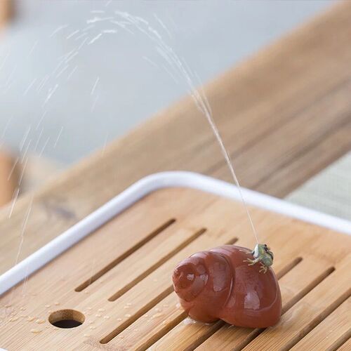 Factory direct sales snail hand-sprayed purple sand small tea pet mini ornaments handle piece can be used to grow tea and play tea ceremony accessories