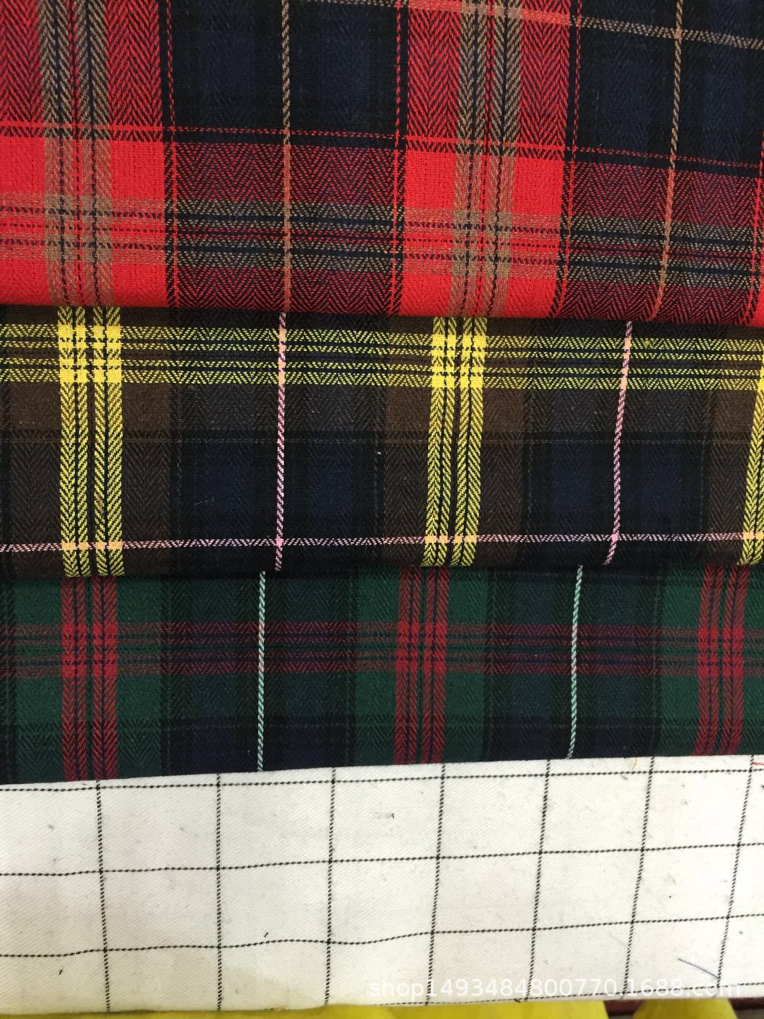 21支色织涤棉混纺格子布衬衫面料现货人字形格子现货供应