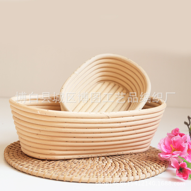 Cesta de fermentación de pan de ratán indonesio natural hecha a mano cesta de bolsa de mimbre redondo tejido europeo cesta de almacenamiento de ratán indonesio ovalada