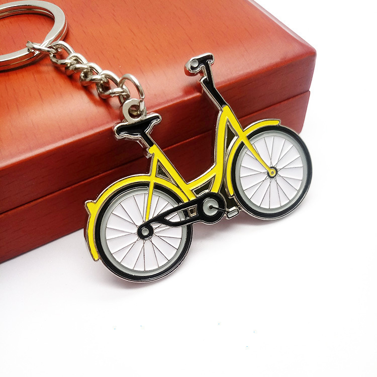 Shenzhen manufacturers metal key chain custom creative cartoon key chain ofo small yellow car paint key pendant