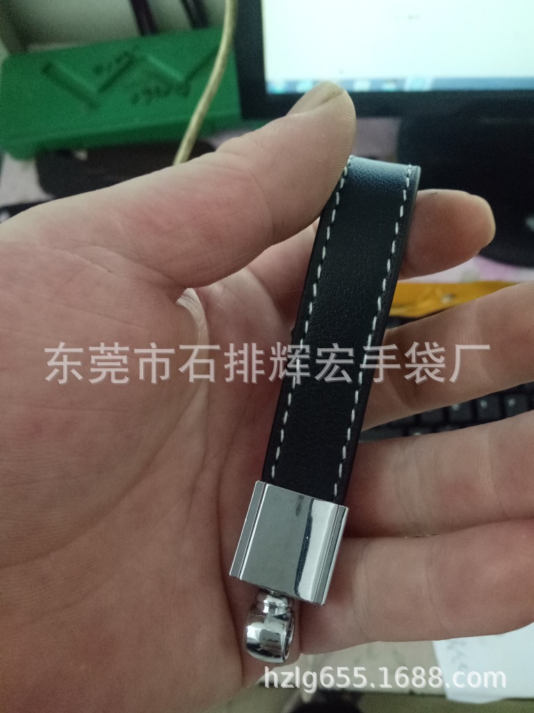 东莞皮带厂生产皮提手皮手挽车子扣皮手挽带真皮钥匙扣工艺皮带