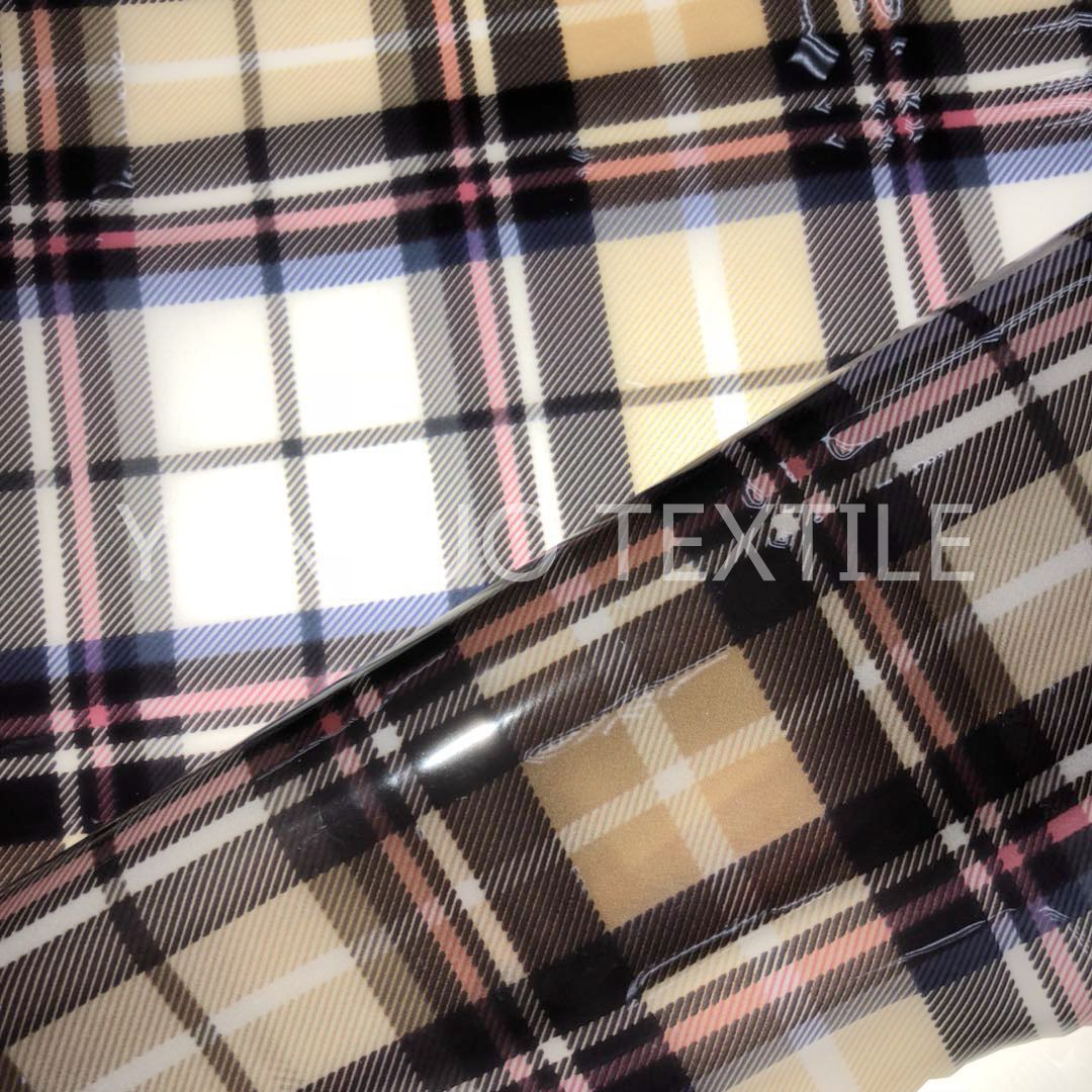 印花TPU面料 数码格子 亮面镜面 时尚女装雨衣款