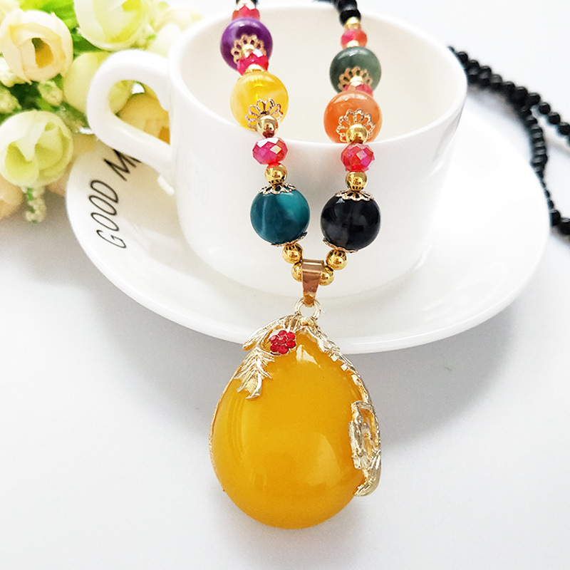 新款仿蜜蜡水滴合金吊坠 民族风时尚秋冬长款毛衣链配饰|ms