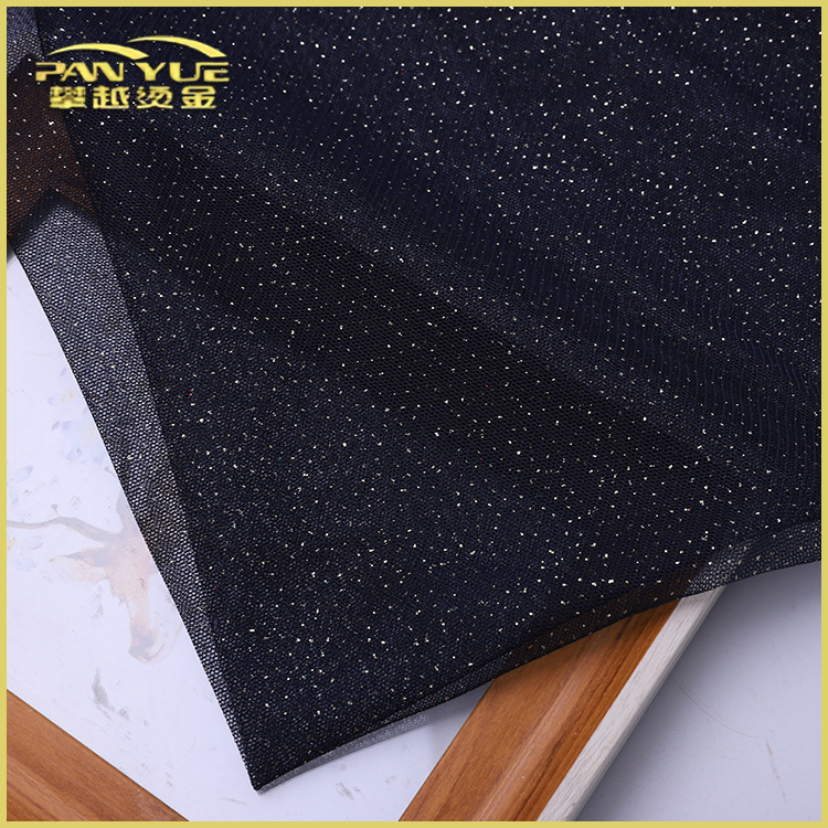 新品直供 时尚全涤网布烫金窗帘面料 婚纱礼服舞台服时装面料成批