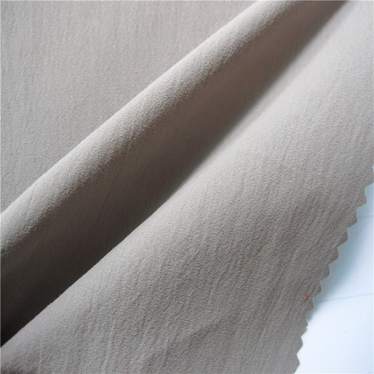 现货棉锦无府绸面料 棉锦无弹水洗皱布 衬衫风衣棉服布料面料批发