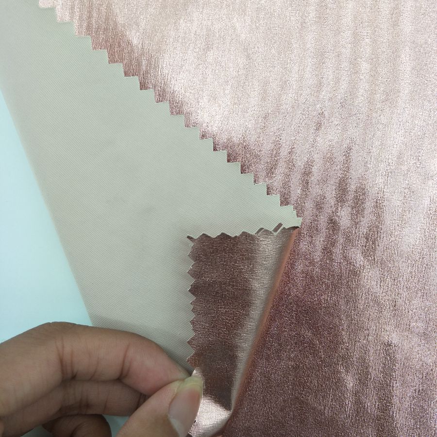 羽绒服棉服烫金面料 三维纺烫粉膜
