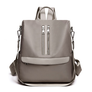 zhenli牛津布新款跨境潮流女包纯色软面时尚运动女发式双肩包批发