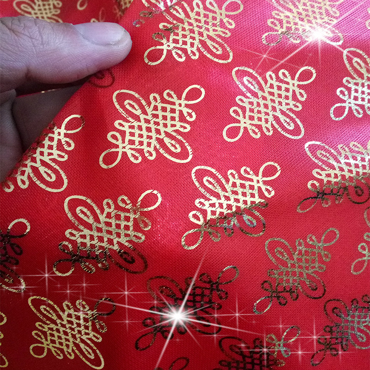 厂家现货直销大红中国结针织布 传统舞台装饰烫金中国结面料批发