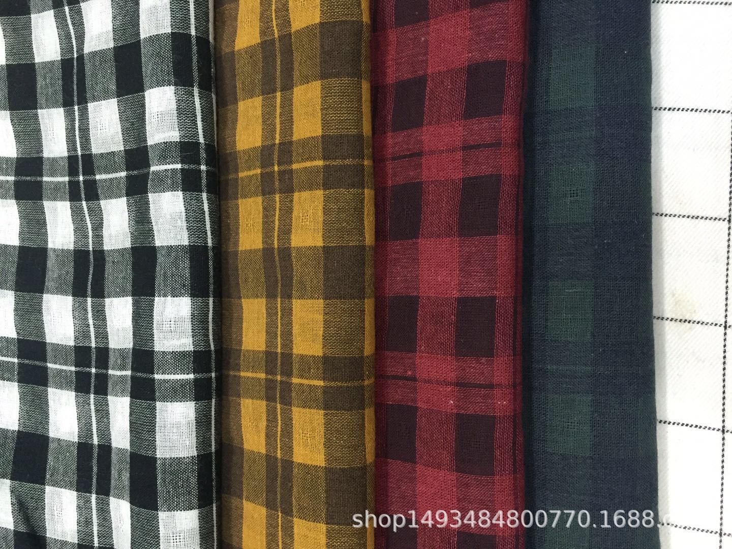 春季薄款色织梭子格子布女装时尚春款衬衫连衣裙面料现货供应