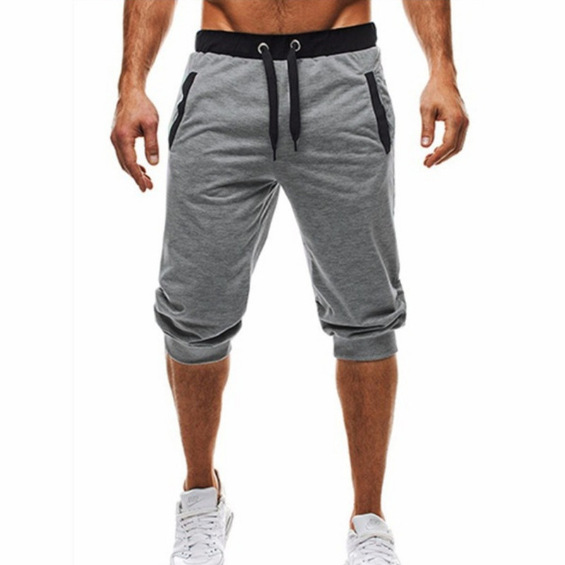 Foreign trade men's new summer wish color matching casual Capris sports pants men's Korean elastic casual pants