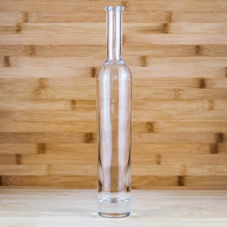 厂家供应晶白料透明玻璃空瓶 加工制作logo 木塞口圆形棒槌白酒瓶
