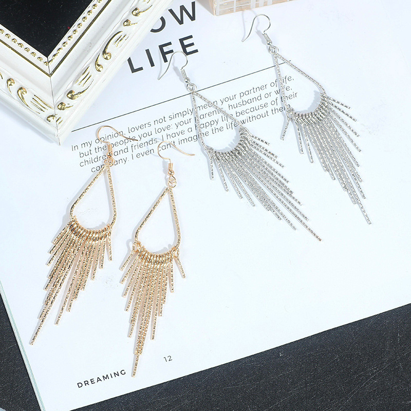 fashionable earrings drop-shaped with tassels