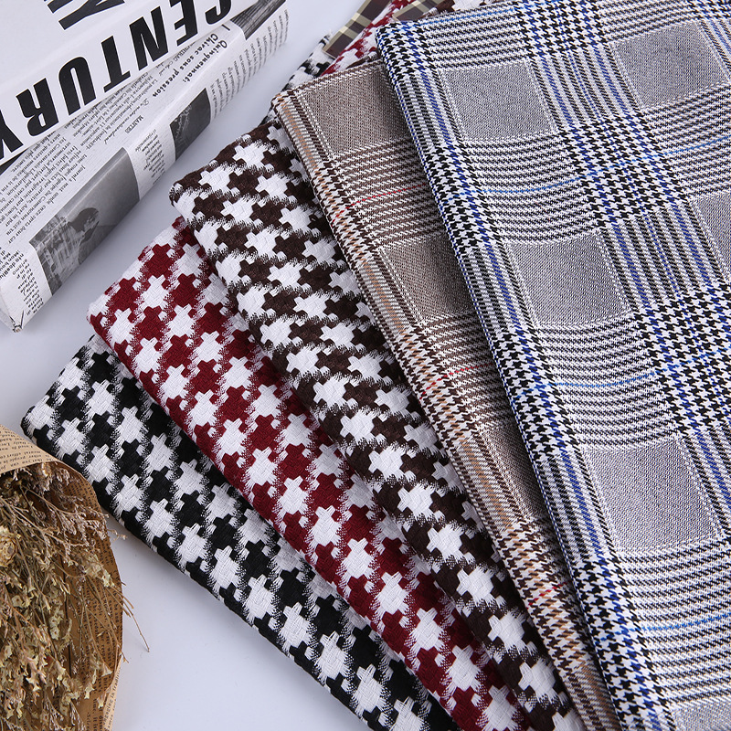 厂家现货 时尚男女童装千鸟格 TR弹力色织格子西装裤子百褶裙面料