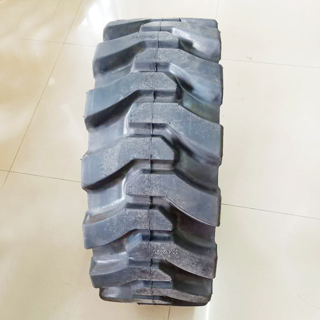 供应33x12-20山猫滑移装载机轮胎 加强型工程机械实心胎 配钢圈