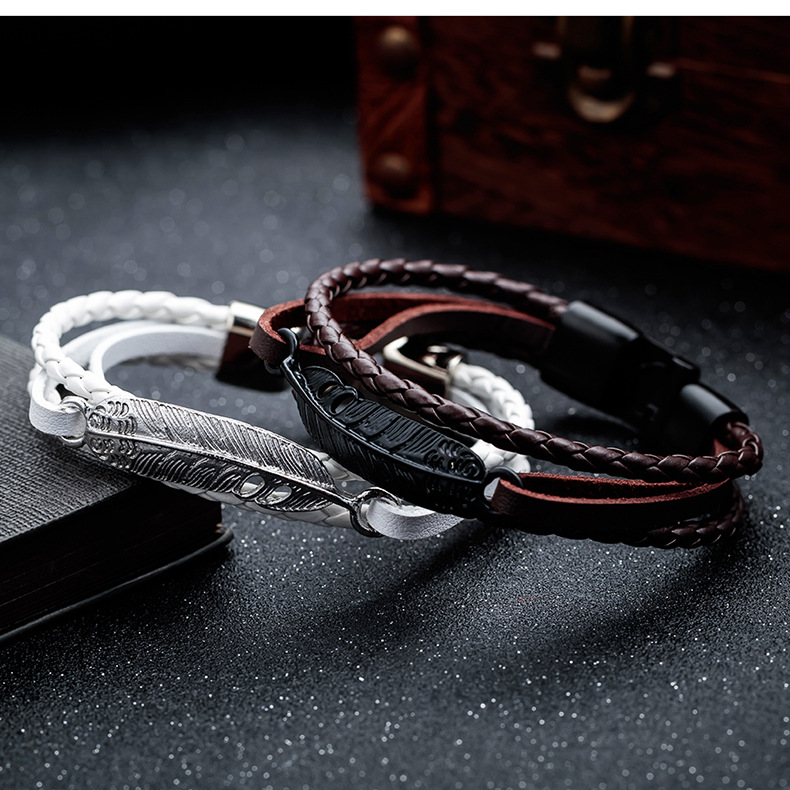 Retro Black Multi-layer Hand-woven Feather Leather Bracelet display picture 3