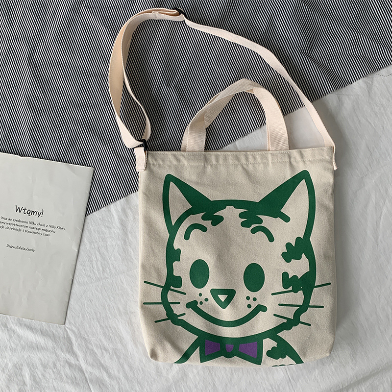 Bolso de lona bolso cruzado para mujer 2025 nuevo estilo estilo japonés versátil bolso de hombro de dibujos animados de gran capacidad bolso de tela para estudiantes estilo k