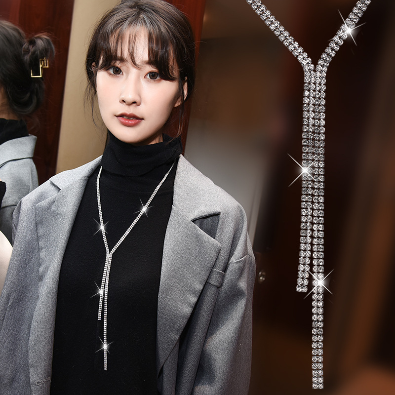 Venta directa de fábrica 2020 europeo y americano simple diamante completo brillante collar ropa mujer accesorios larga borla suéter cadena al por mayor