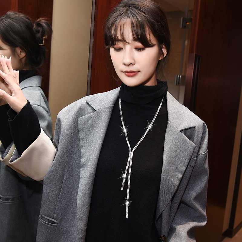 Venta directa de fábrica 2020 europeo y americano simple diamante completo brillante collar ropa mujer accesorios larga borla suéter cadena al por mayor