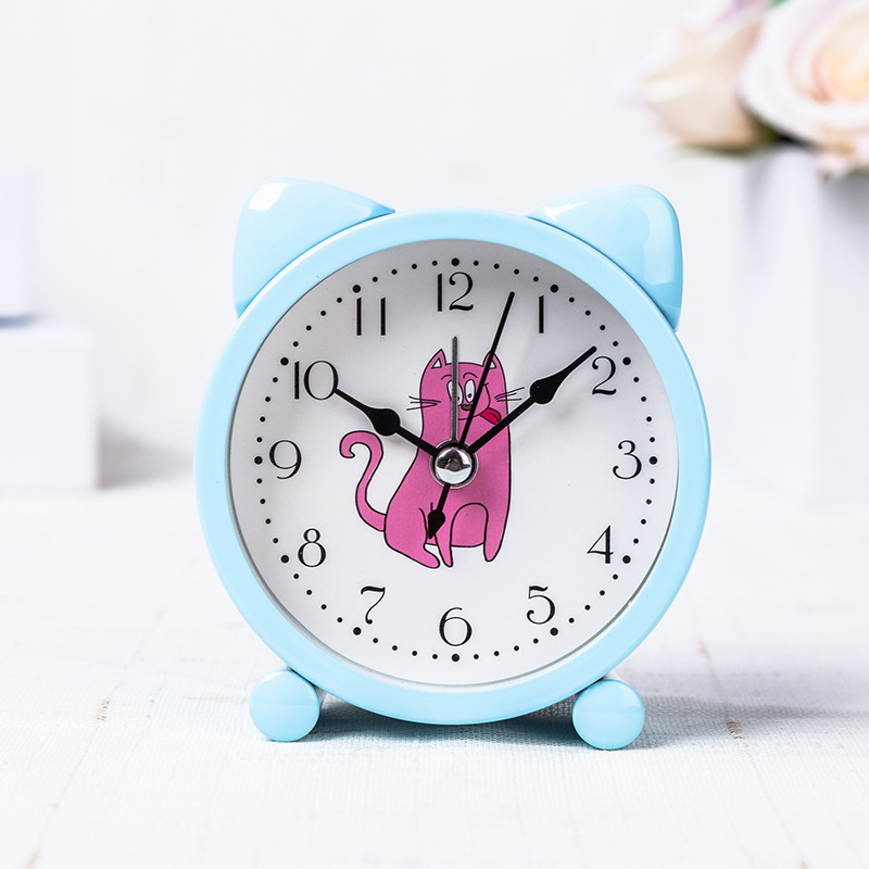 Fábrica directa niños creativos estudiante de metal redondo en forma de gato reloj despertador dormitorio mesita de noche reloj despertador mudo al por mayor