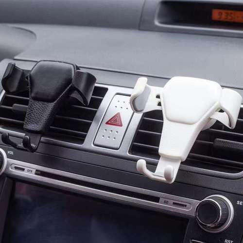 New creative car air outlet mobile phone holder, car leather texture gravity mobile phone holder, automotive supplies manufacturer