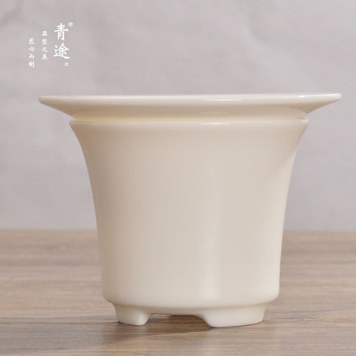 Dehua mutton fat jade porcelain tea maker filter rack ceramic pure white tea leakage kungfu tea set accessories tea ceremony filter wholesale